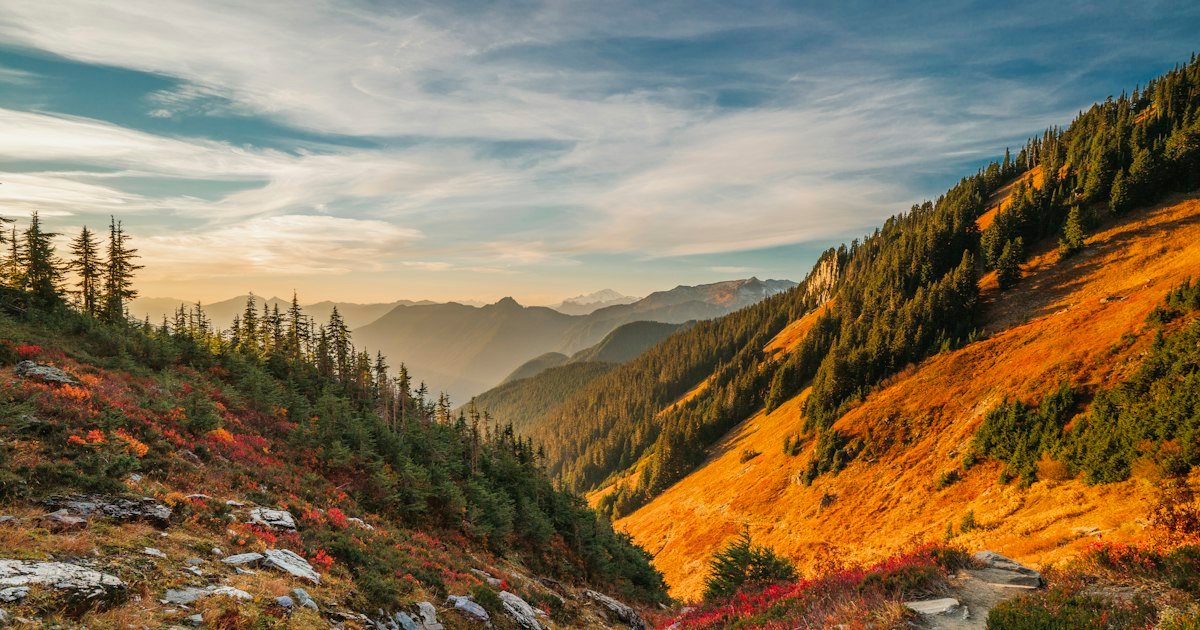 Autumn mountain terrain where daylight and trail visibility change