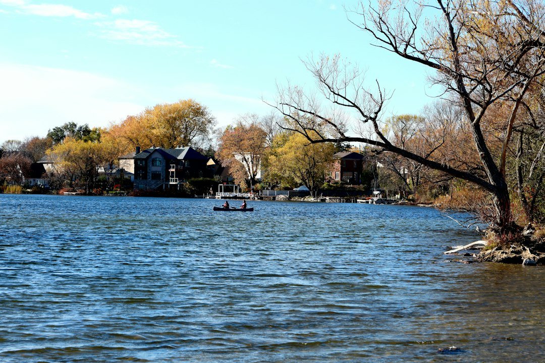 Two people paddling on a lake, illustrative outdoor photo